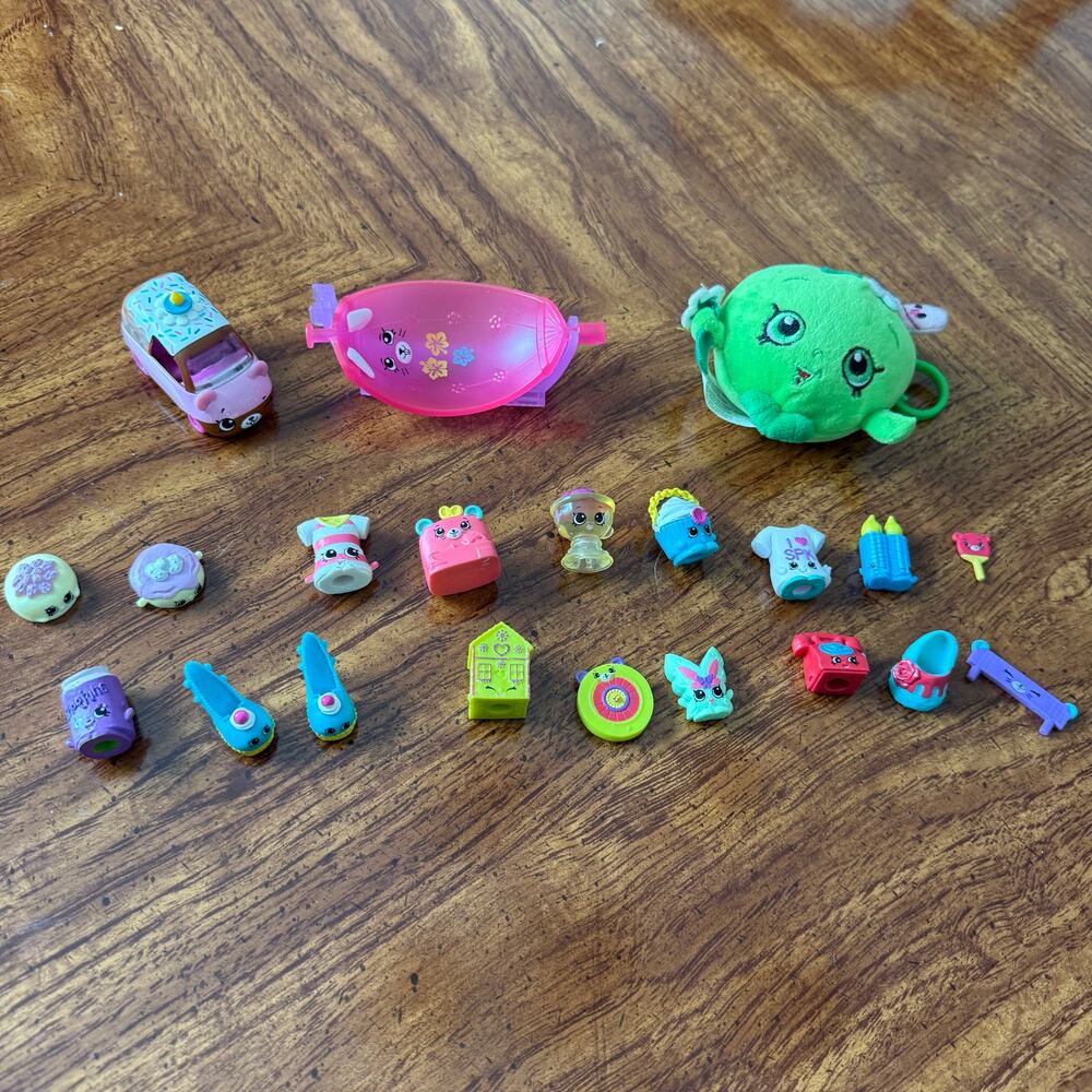 Shopkins lot of 18 plus a cutie car. Preowned.